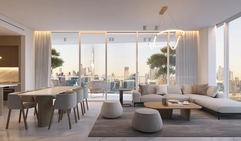 Living and dining room in a DG1 apartment with views of the Burj Khalifa