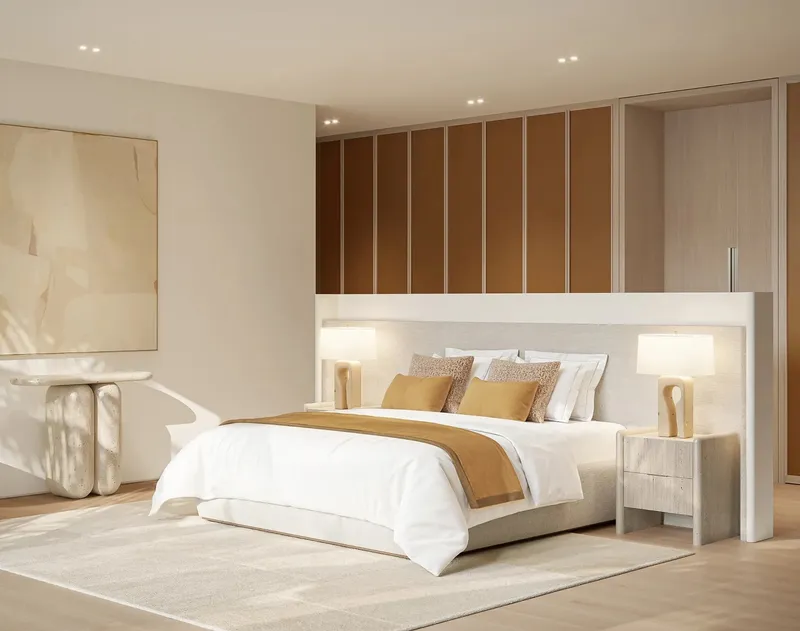 Bedroom of an Aurora villa at Eden Hills with a low headboard wall and timber wardrobes