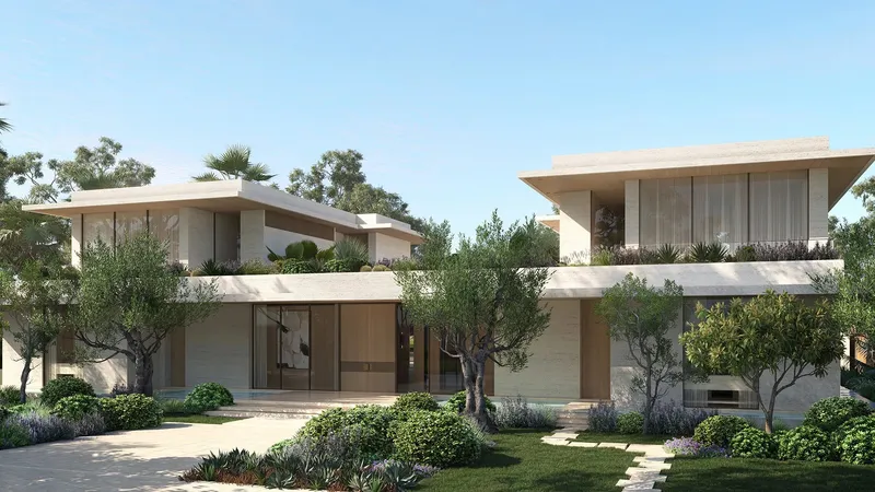 Front of a six-bedroom villa at Eden Hills with deep flat roofs, olive trees and planted beds