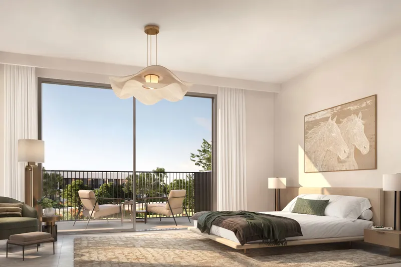 Bedroom in an Equiterra home opening onto a balcony
