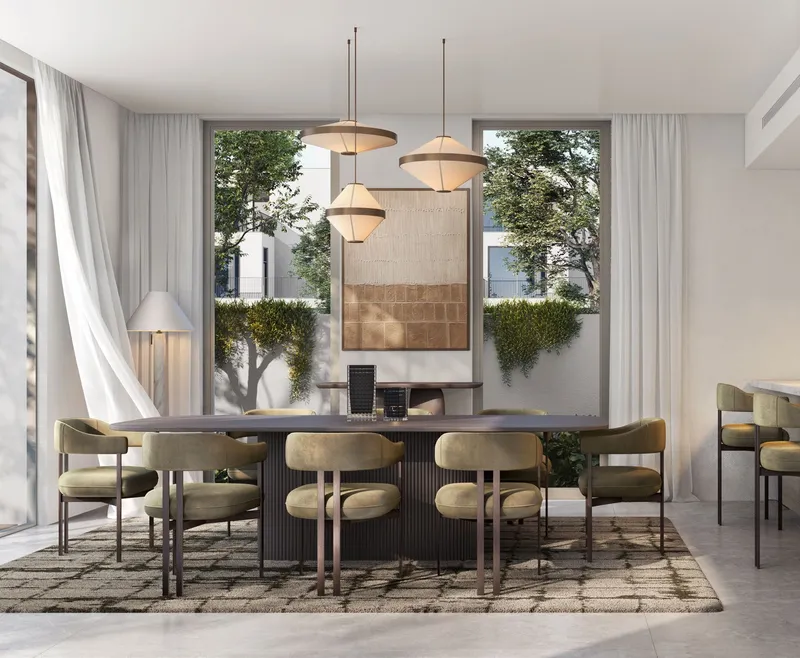 Dining room in an Equiterra home with neutral finishes and garden views