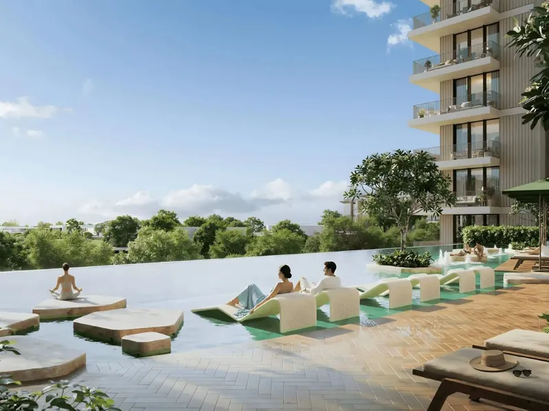 Infinity edge pool with yoga stepping stones at Ghadeer, Expo Valley Views