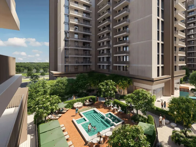 Podium courtyard pool between residential towers at Expo Valley Views