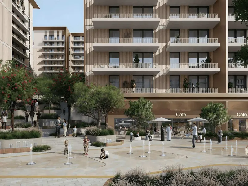 Ground floor cafe units and splash pad plaza beneath the apartments at Expo Valley Views