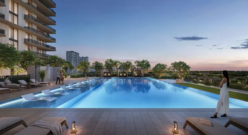 Render of the Greencrest swimming pool at dusk with in-water loungers