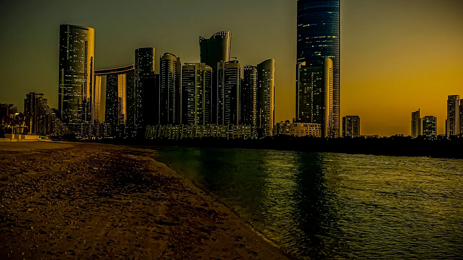 Al Reem Island towers at dusk seen from the waterfront, Abu Dhabi