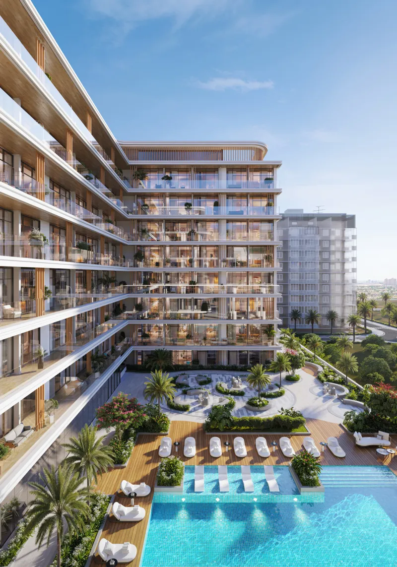 Elevated view over the HOLM One pool, loungers and landscaped courtyard