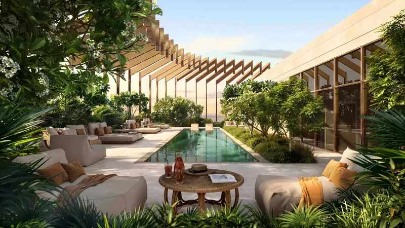 Rooftop terrace with a lap pool and lounge seating at Kanyon