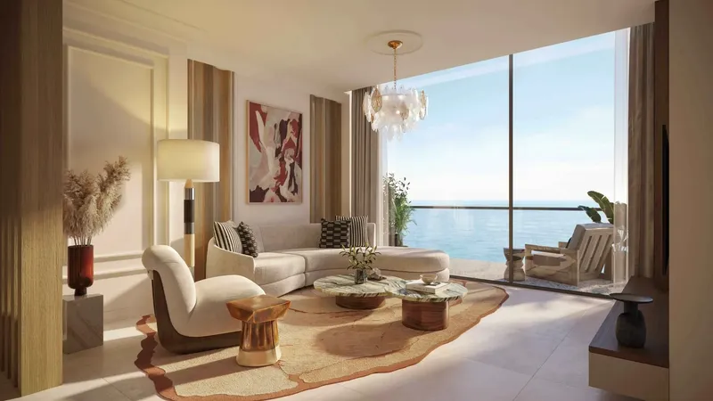 Living room with full-height glazing and sea views at Le Château by BEYOND