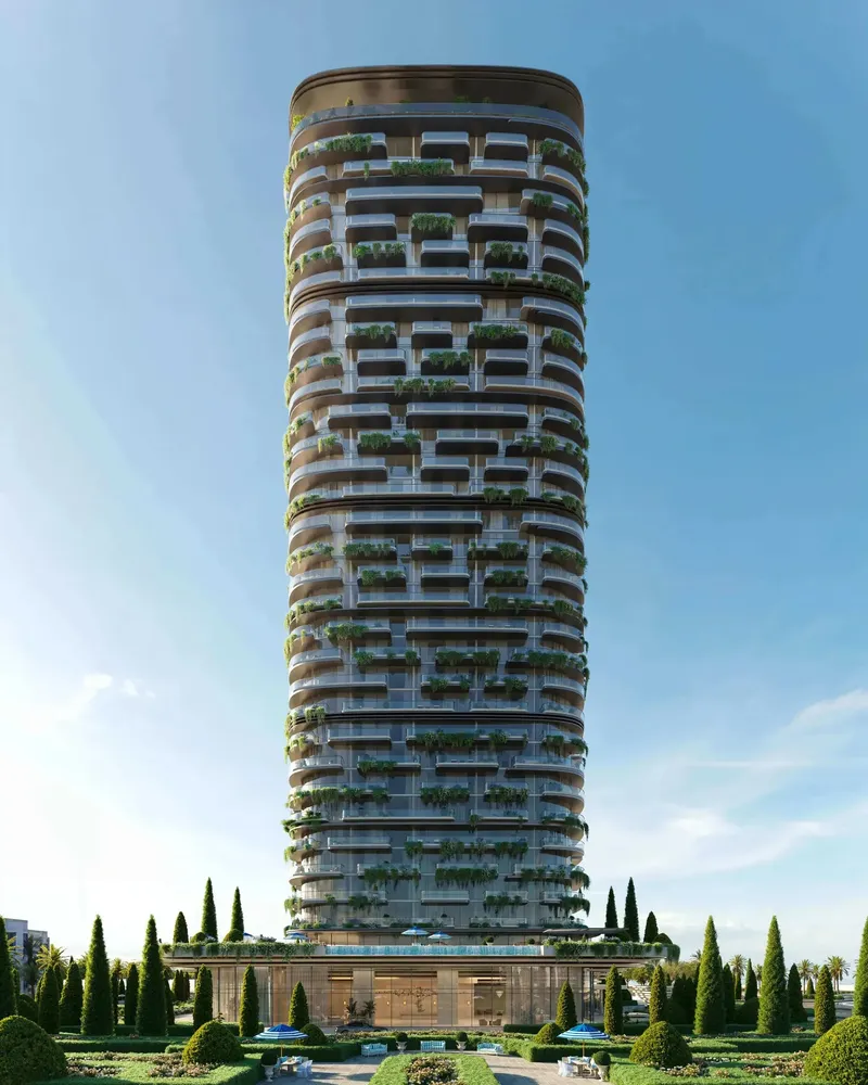 Full height of the 31-storey Le Château tower above formal gardens, Ras Al Khaimah