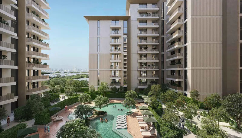 Courtyard pool at Expo Valley Views with the Dubai skyline in the distance