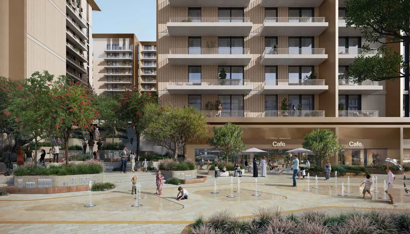 Podium level plaza at Expo Valley Views with cafes and water jets