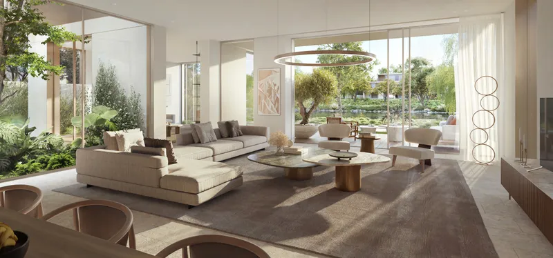 Double-height living room in an Amber Collection villa opening to the garden