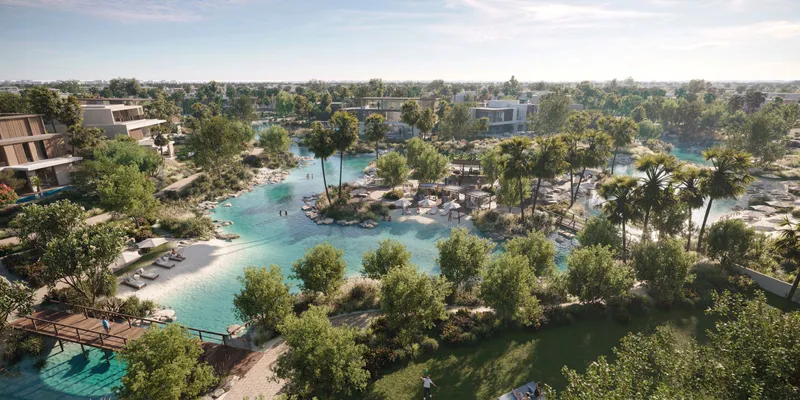 Aerial view of the swimmable lagoons, beaches and villas at The Acres