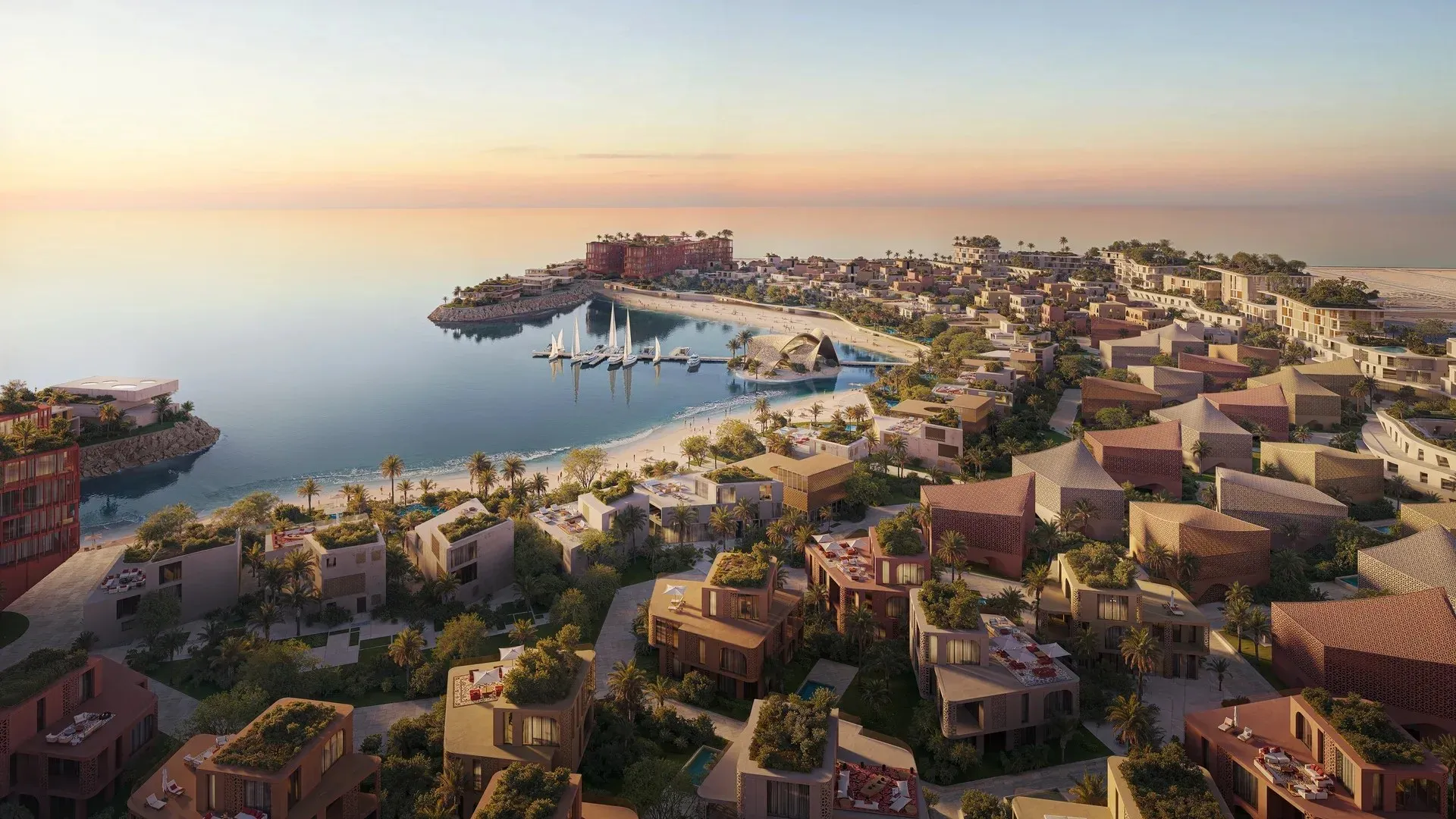 Aerial view of Mira Coral Bay with its marina, beach and low-rise homes