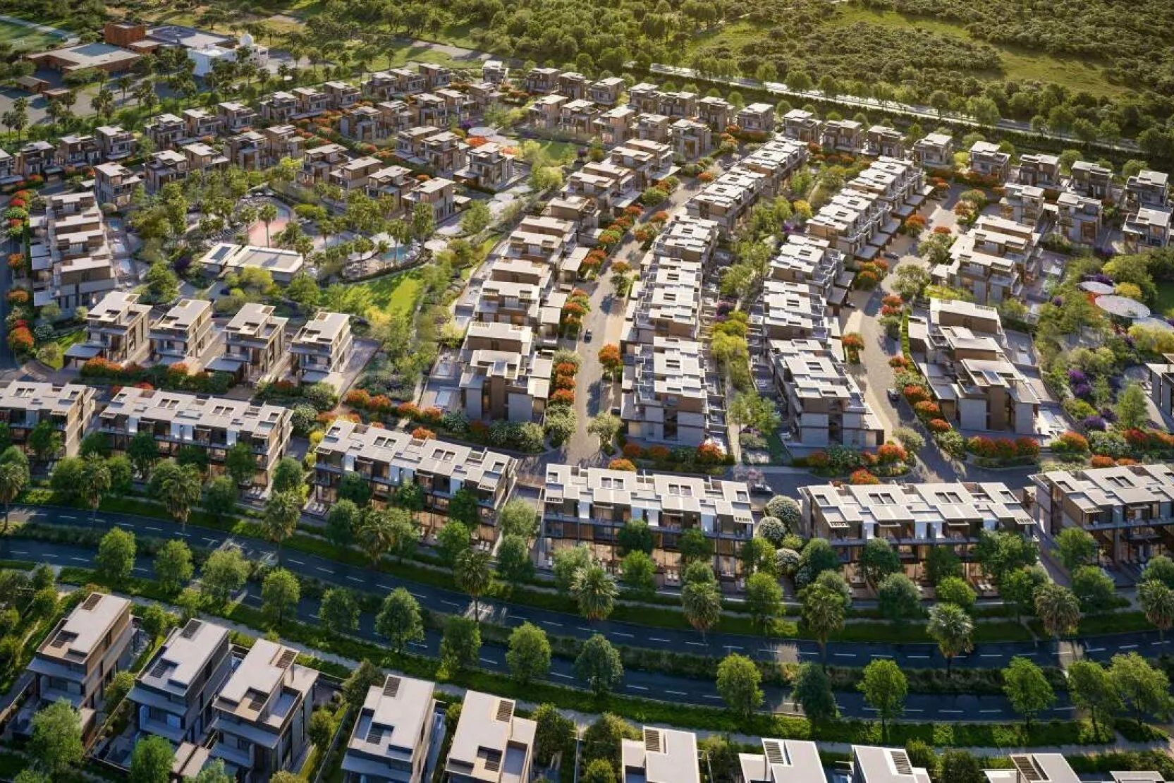 Aerial render of Nad Al Sheba Gardens showing rows of villas and townhouse clusters among tree lined streets, pools and green corridors