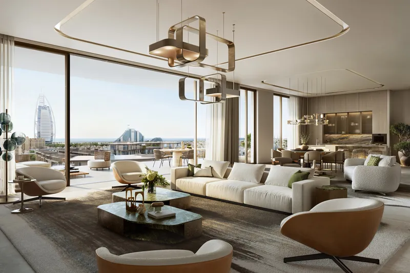 Render of the four-bedroom residence living area at Nourelle with a sofa, dining table and wide glazing onto a terrace and the coast