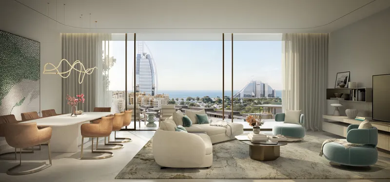 Render of a three-bedroom living and dining room at Nourelle with floor-to-ceiling windows looking towards the Burj Al Arab