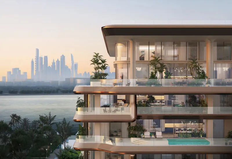 Residential terraces with plants and a private pool, with the Dubai Marina skyline behind