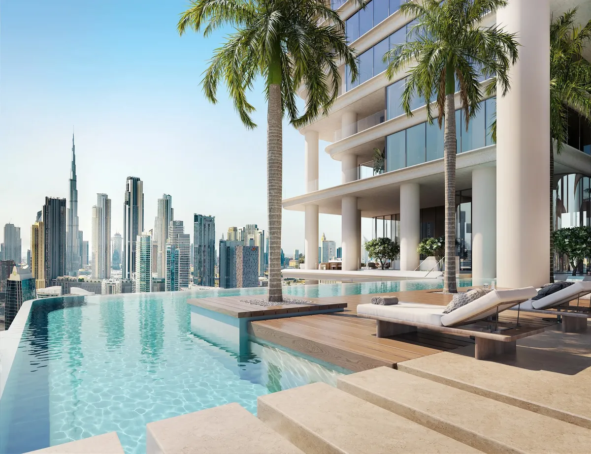 Render of the infinity sky pool at VELA Viento with palm trees and the Downtown Dubai skyline beyond
