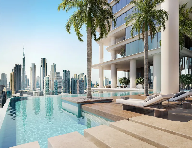 Render of the infinity sky pool at VELA Viento with palm trees and the Downtown Dubai skyline beyond