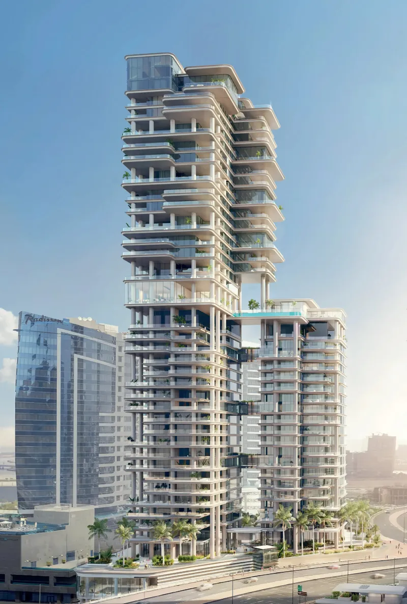 Render of VELA Viento's two connected towers with stacked terraces and a skybridge pool, Marasi Bay, Business Bay