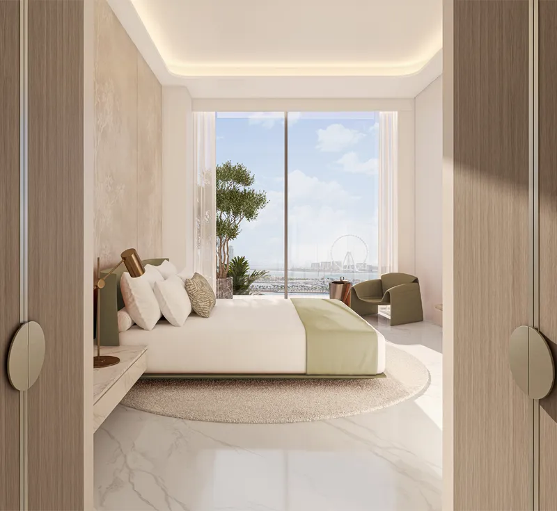 Furnished bedroom at Palm Beach Towers with a floor-to-ceiling window