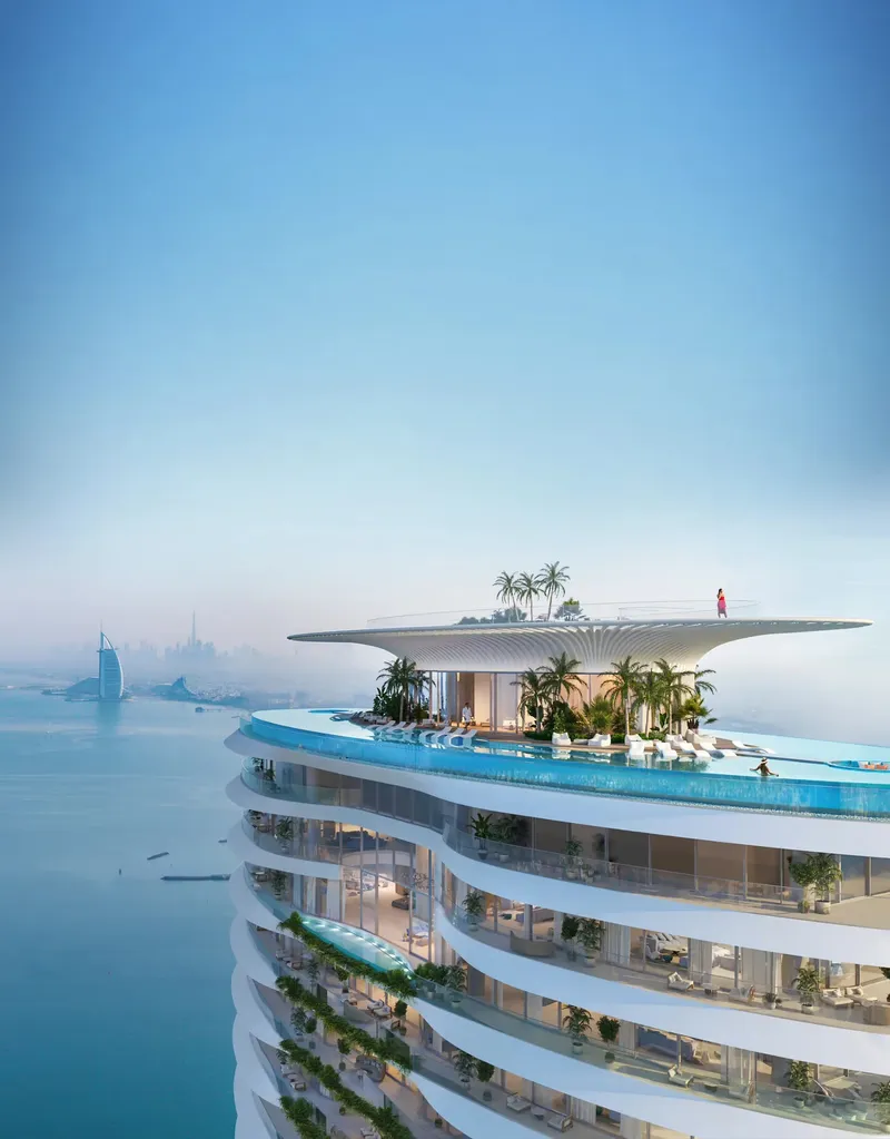 Rooftop infinity pool on top of a Palm Beach Towers tower, with the sea and Palm Jumeirah beyond