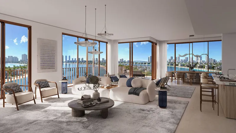 Corner living room at Palm Central Private Residences with floor-to-ceiling windows on two sides