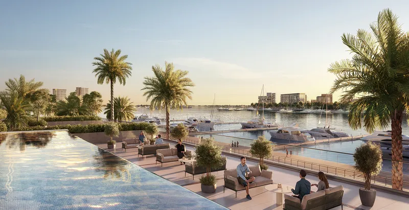 Render of the Pier Point infinity pool deck looking over the marina and moored yachts