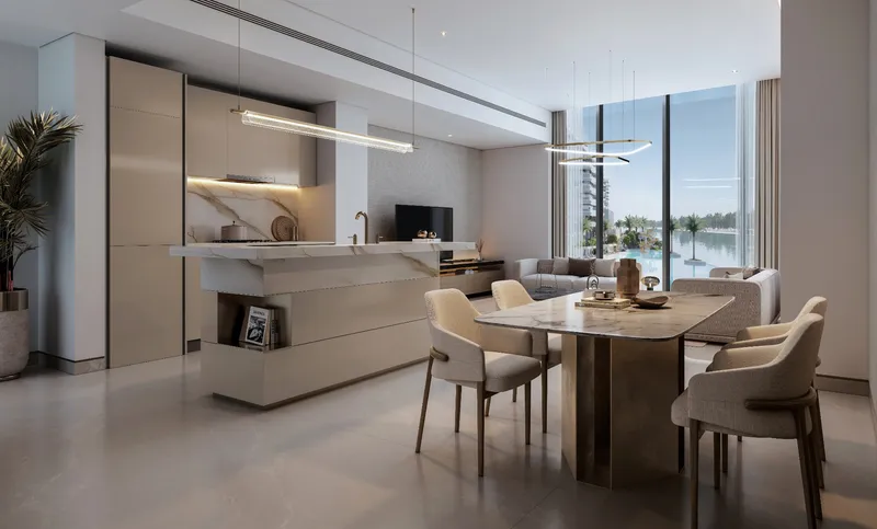 Open kitchen and dining area with water views at River Cove Residences