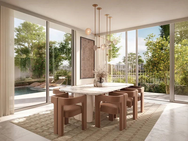 Interior render of a Rivera townhouse dining area with a marble table and garden views