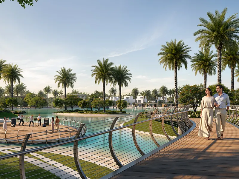 Render of a curved boardwalk beside a lagoon pool at The Heights