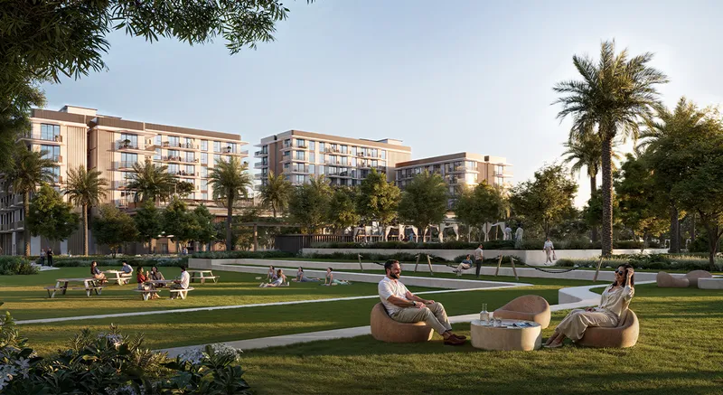 Render of residents relaxing on a landscaped lawn with the Sera apartment buildings behind