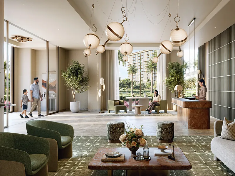 Interior render of a residents' lobby lounge with armchairs, pendant lights and a reception desk