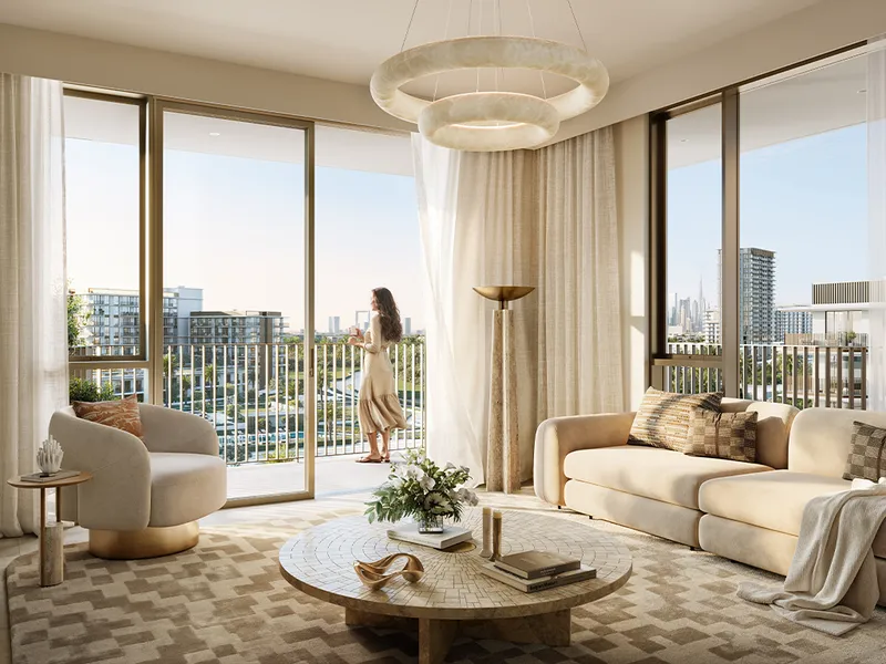 Interior render of a bright living room with a round coffee table and full-height windows onto a balcony