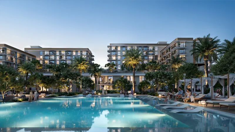 Render of the Sera pool deck at dusk with cabanas and palm trees in front of the low-rise apartment buildings