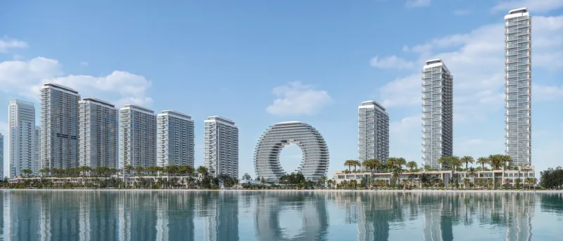 Sobha Aquamont towers and the ring-shaped landmark on the Downtown Umm Al Quwain waterfront
