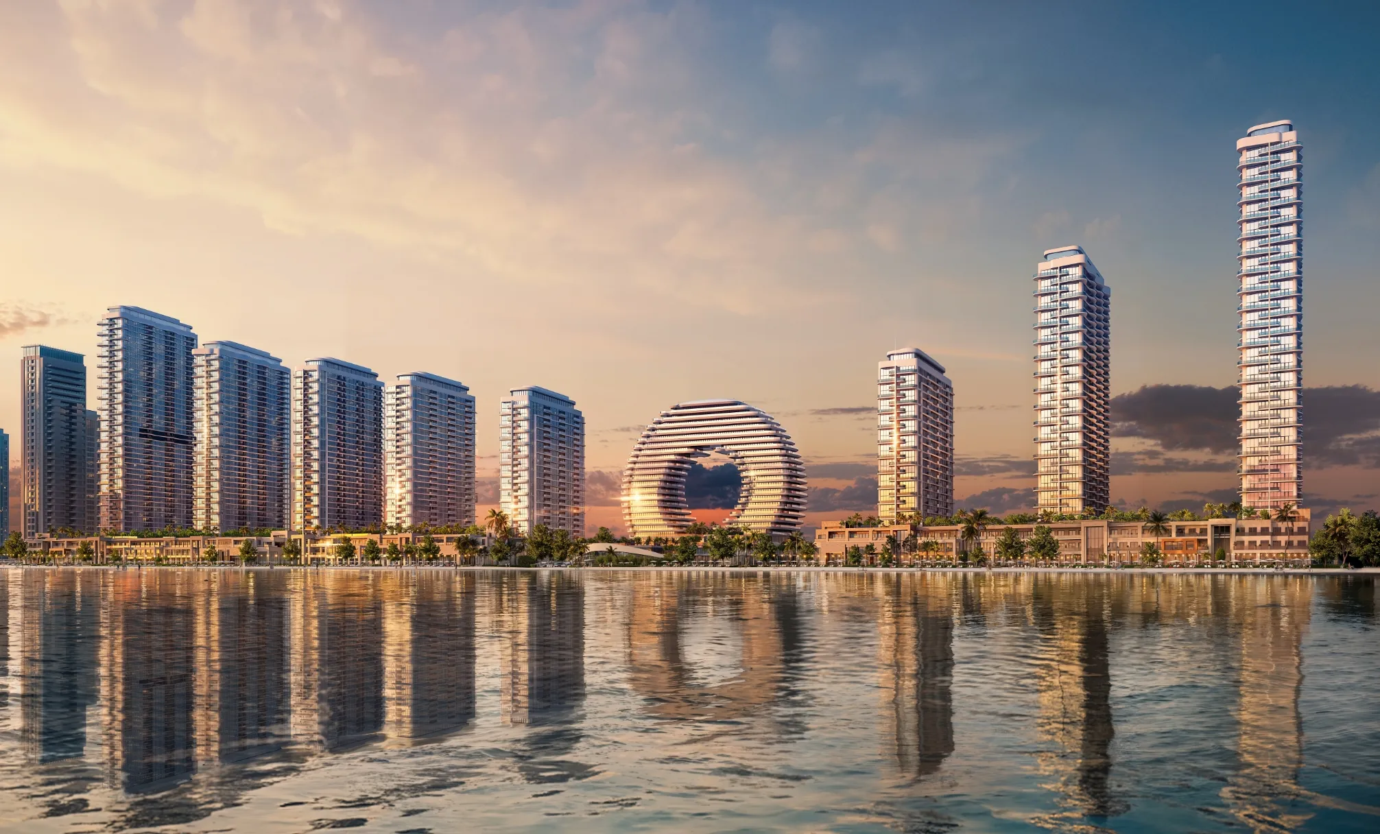 Sobha Aquamont skyline at dusk reflected in the water at Downtown Umm Al Quwain