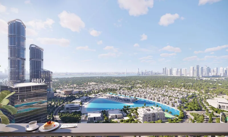 Render of the view from a Sobha Hartland II apartment balcony over the villa community and lagoon towards Business Bay