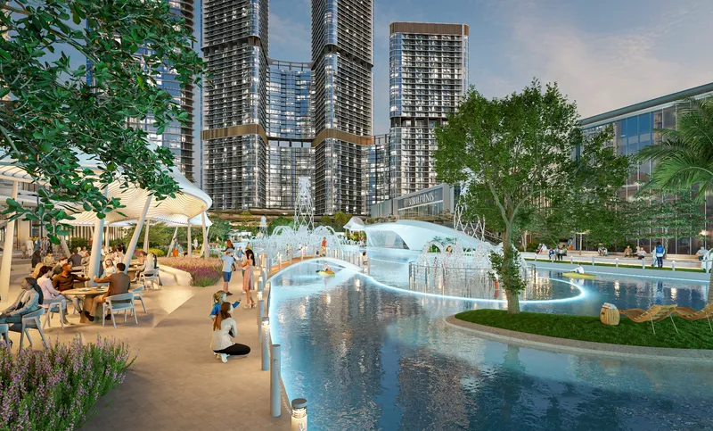 Render of the lagoon promenade at Sobha Hartland II with outdoor dining beside the water