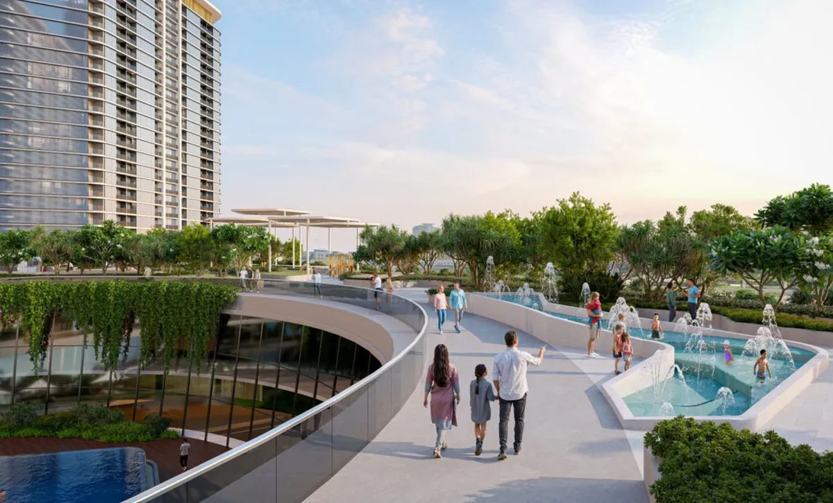 Sobha Solis podium promenade with play fountain and gardens between the towers