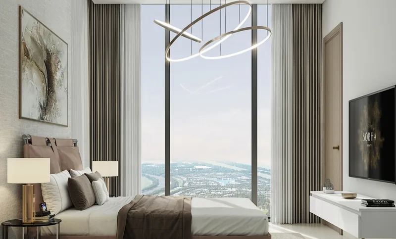 Sobha Solis bedroom with a full-height window over Motor City