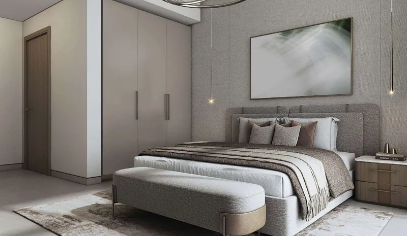 Master bedroom at The Woods Abode with fitted wardrobes, an upholstered headboard and pendant bedside lighting
