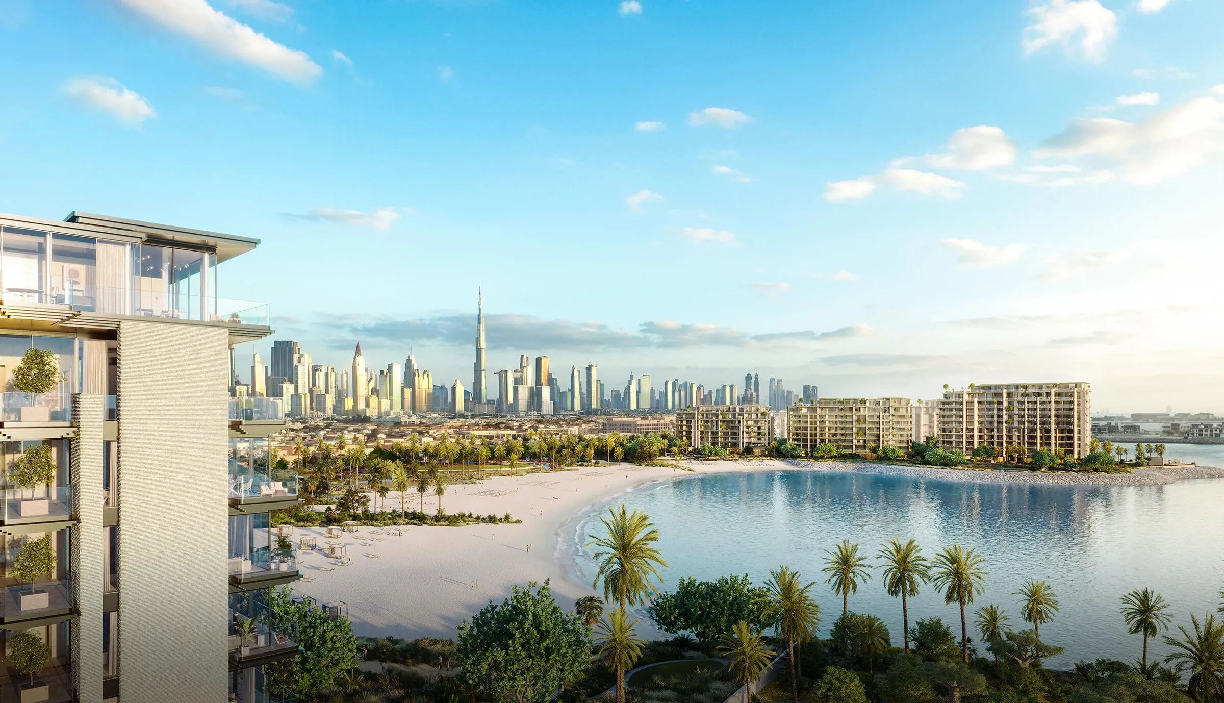View from a Solaya balcony over the private beach and the neighbouring buildings toward Burj Khalifa and the Downtown Dubai skyline at sunset