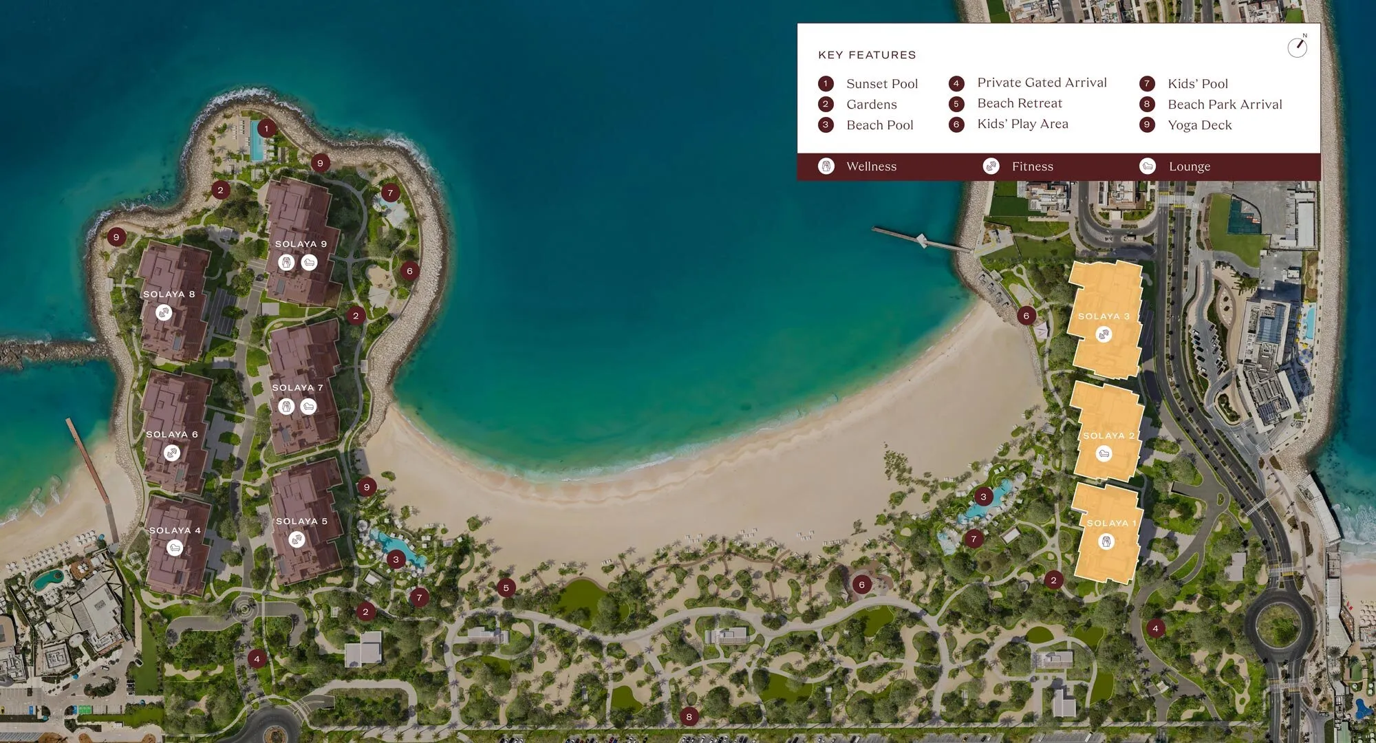 Developer masterplan of Solaya showing the nine buildings along the crescent bay, with Solaya 8 and Solaya 9 on the rocky headland and the sunset pool, beach pools and yoga decks marked