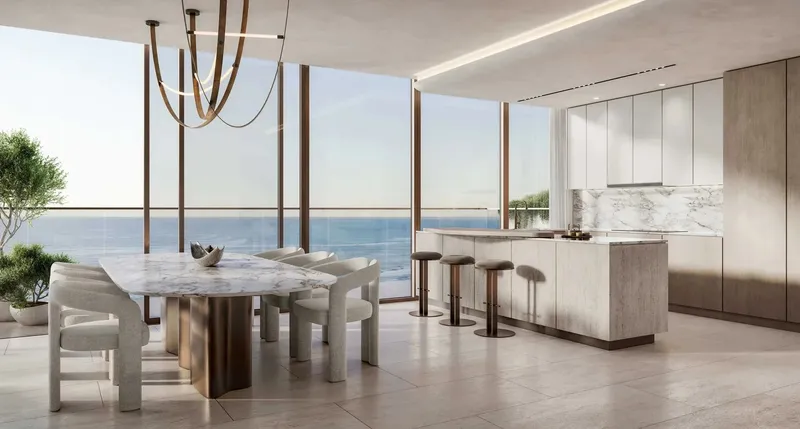 Kitchen and dining area opening to the sea at Soulever