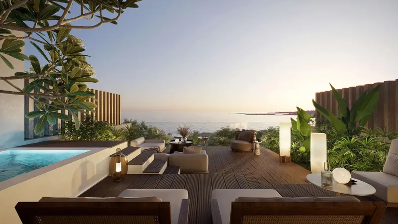 Private terrace with plunge pool and lounge seating looking out to sea at Soulever