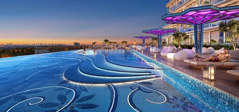 Infinity pool on the Sparklz by Danube podium with mosaic detailing at sunset