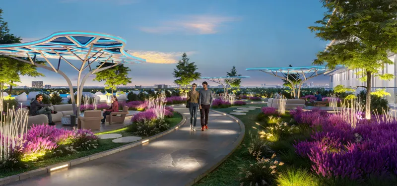 Sparklz Garden, a landscaped podium walk with shaded seating at Sparklz by Danube